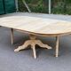 Large round extendable dining table renovated in raw pine with 2 extensions, 1980.