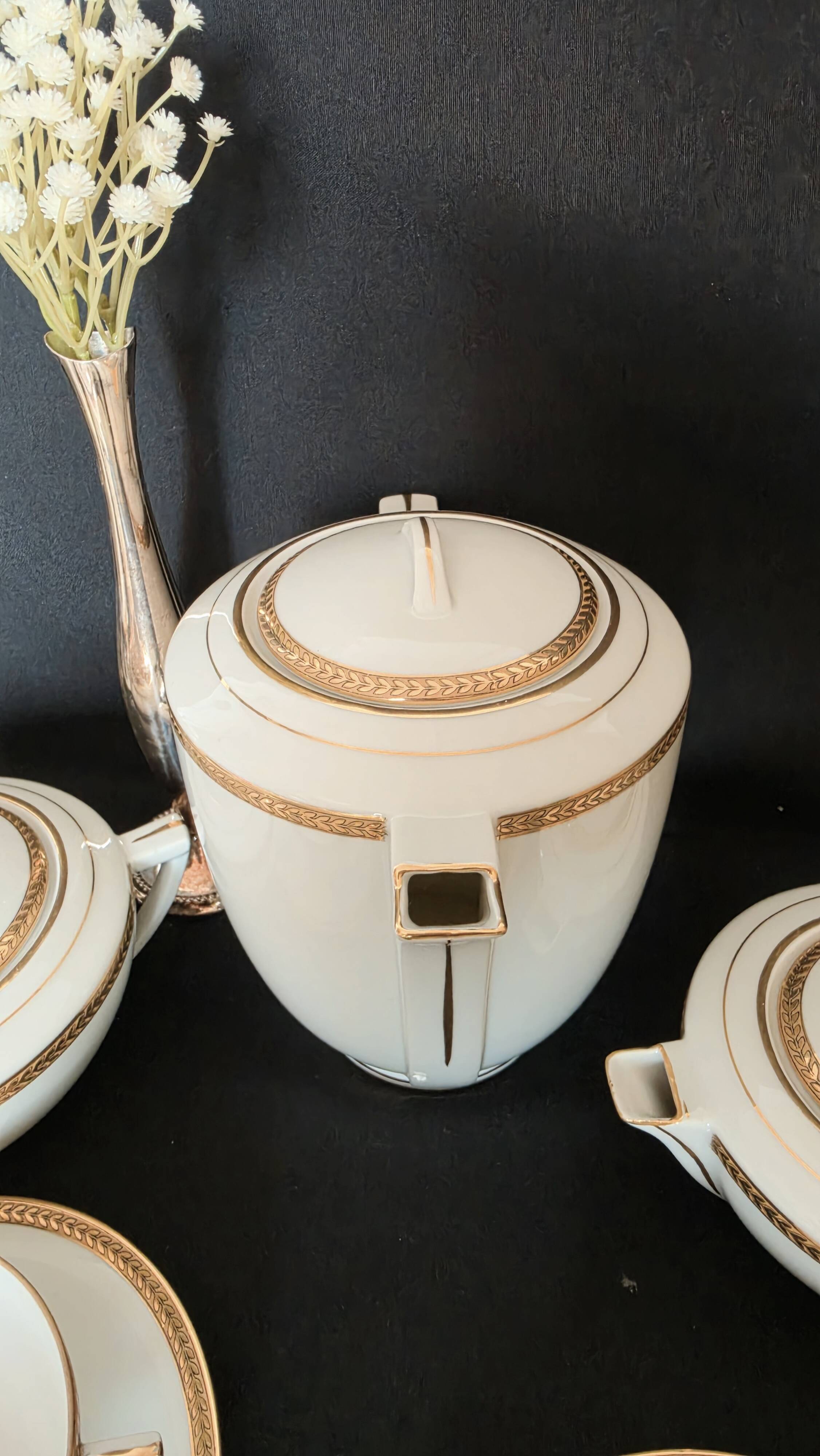 Coffee or tea service in Limoges porcelain and gold, France, Art style.