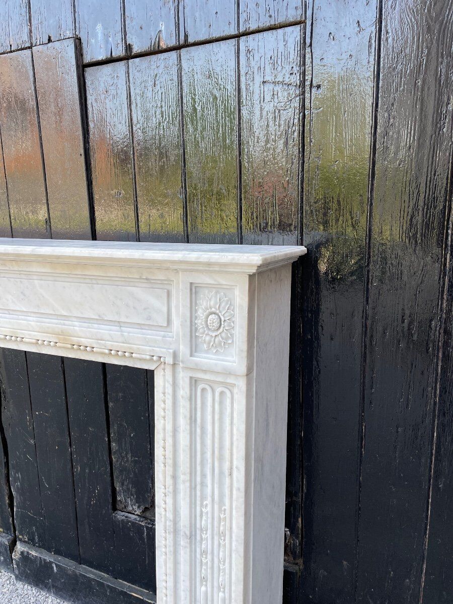 Louis XVI fireplace in Carrara marble