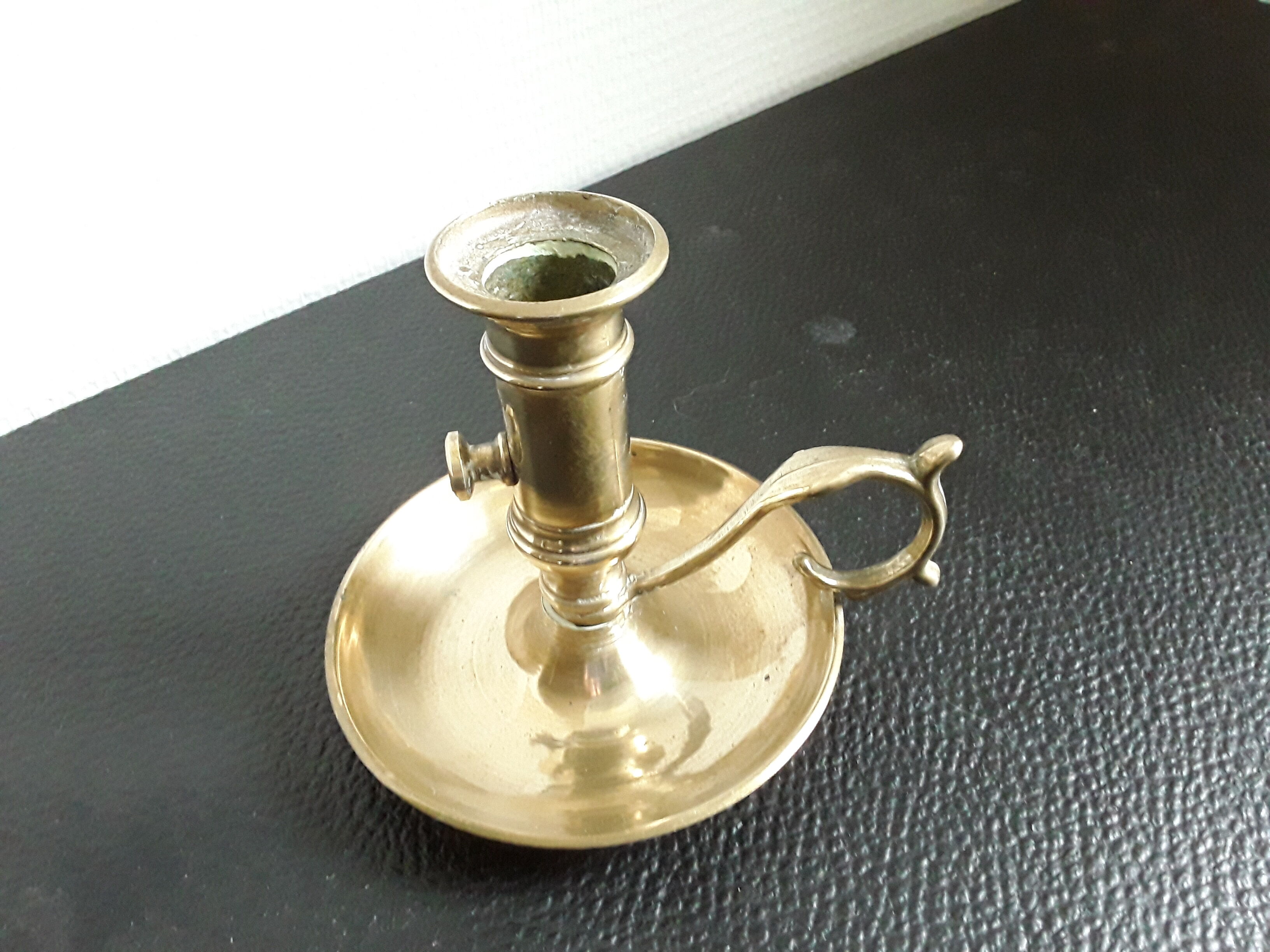 Candle holder with vintage brass handle