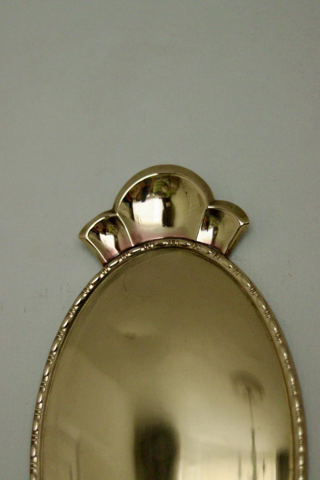 Pair of Swedish brass wall sconces from the mid-century.