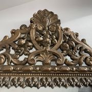 Small mirror with brass parcloses in repoussé style Louis XIV, late 19th century.