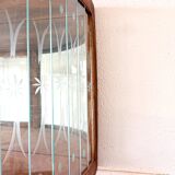 Art Deco-style wall-mounted display cabinet with floral engraving