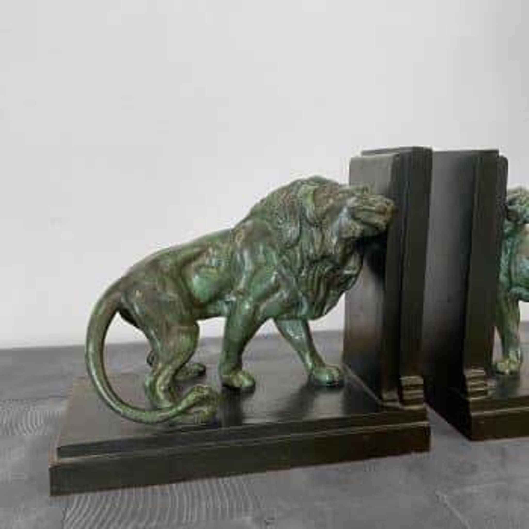 Lion and lioness bookends by Joseph Carlier, 1930