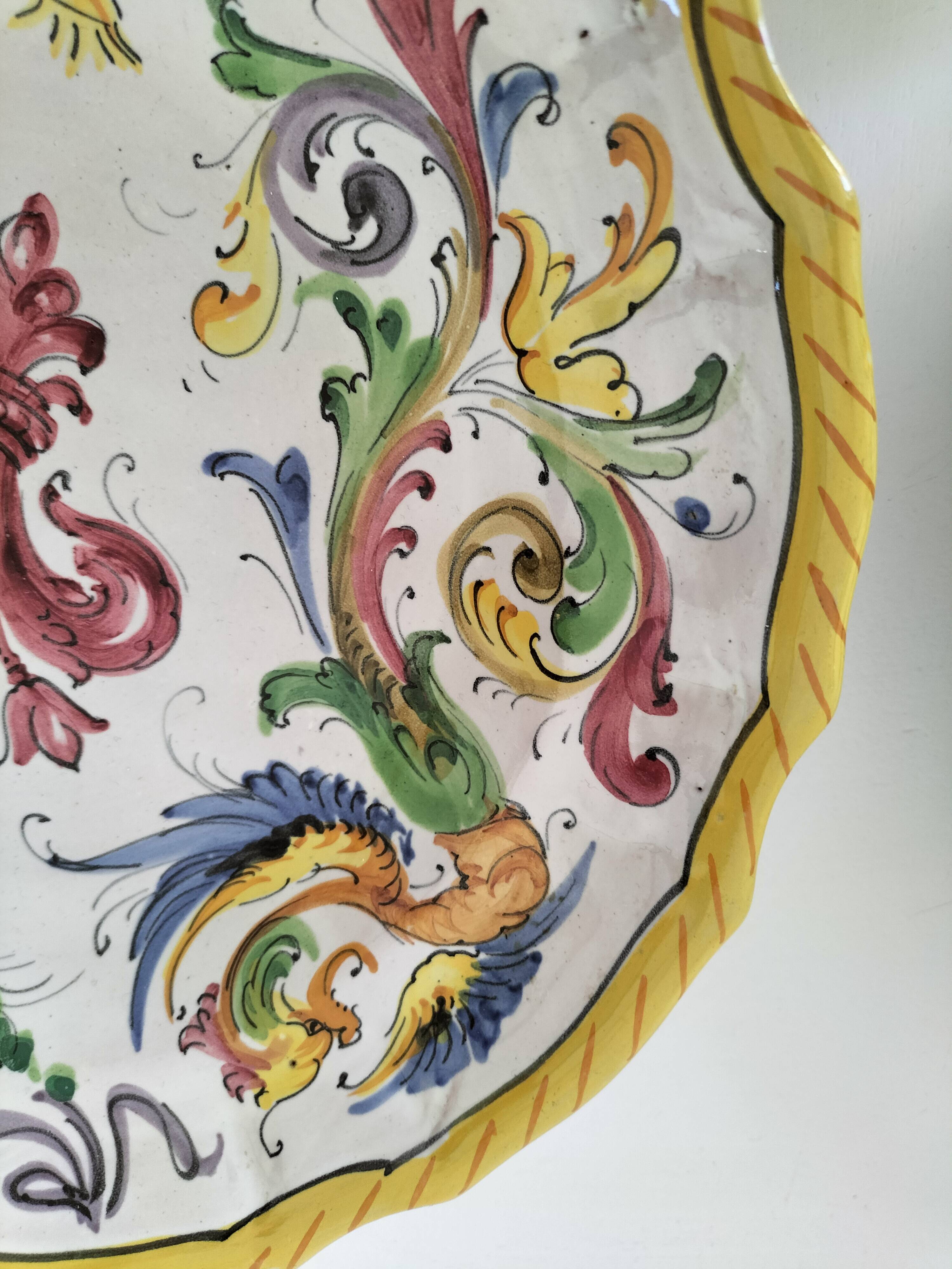 4 hand-painted earthenware plates in a holiday home style