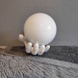 White ceramic hand sconce with white opaline globe