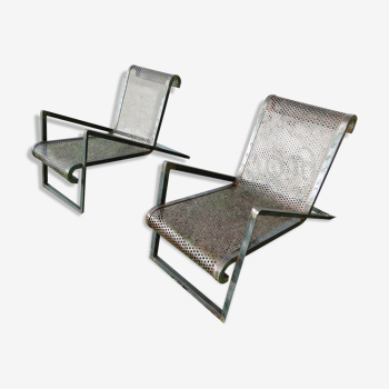 Pair of perforated metal garden armchairs
