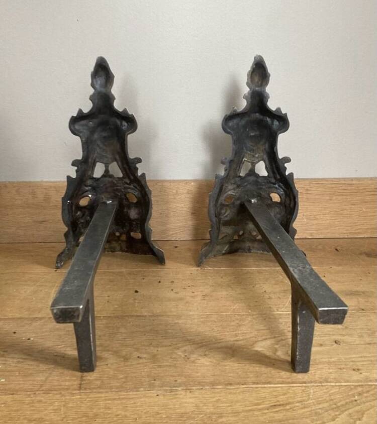 Pair of Louis XV andirons in solid bronze, early 20th century