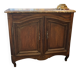 Oak hunting buffet in Louis XIV style, 18th century, with a marble top.