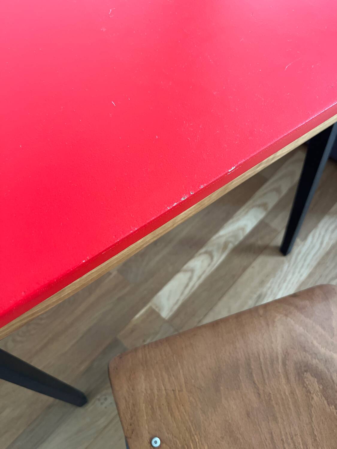 Vintage 1960s school desk with a red Formica top.