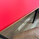 Vintage 1960s school desk with a red Formica top.