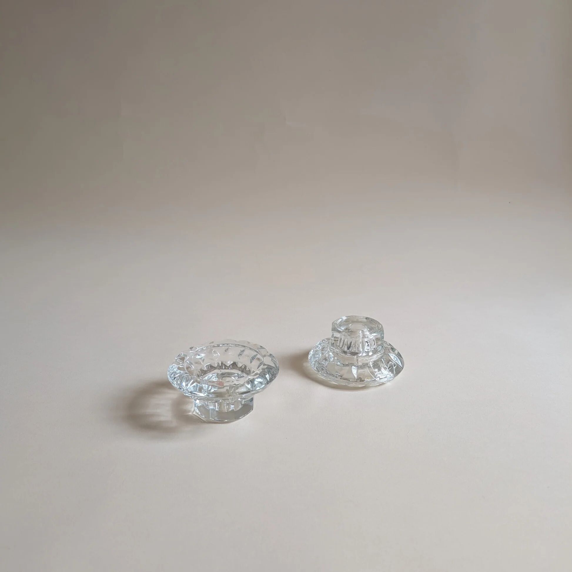 Pair of chiseled glass candlesticks, octagonal base