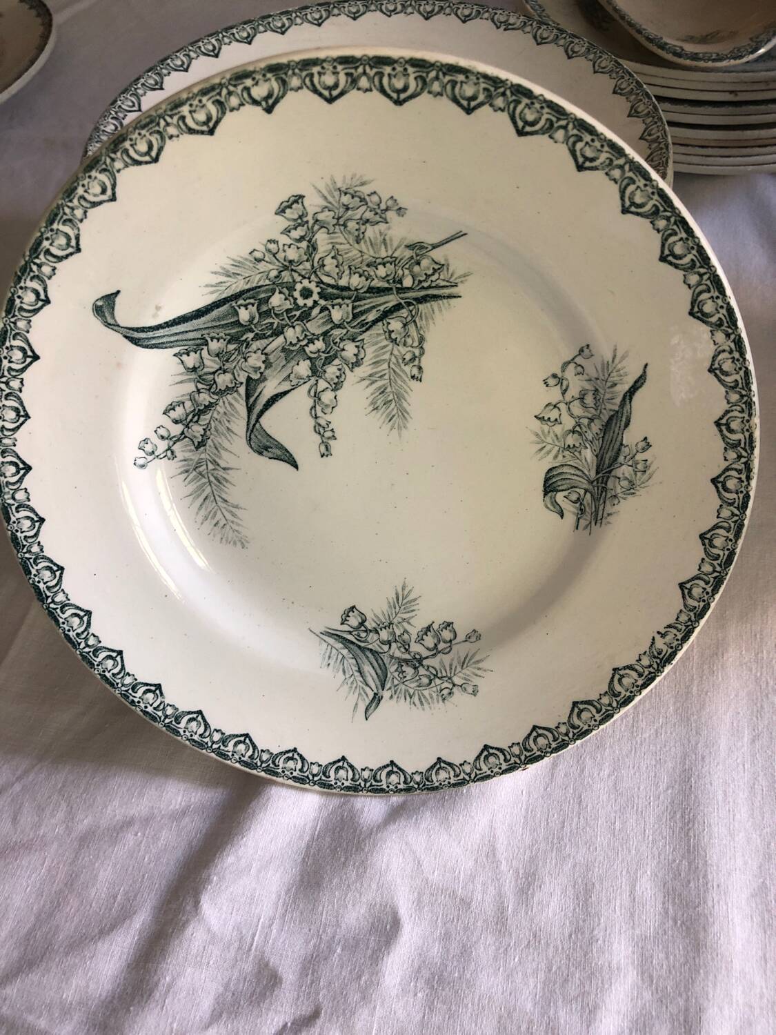 17 St Amand ironware plates, "Muguet" model