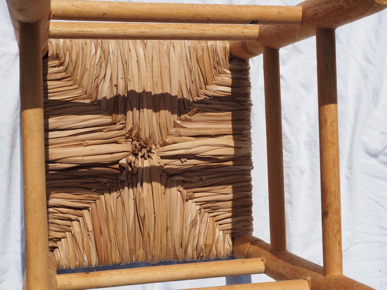 Low stool in wood and straw