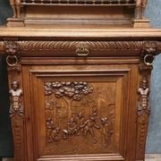 Important pair of two-body buffets in richly carved Renaissance style.