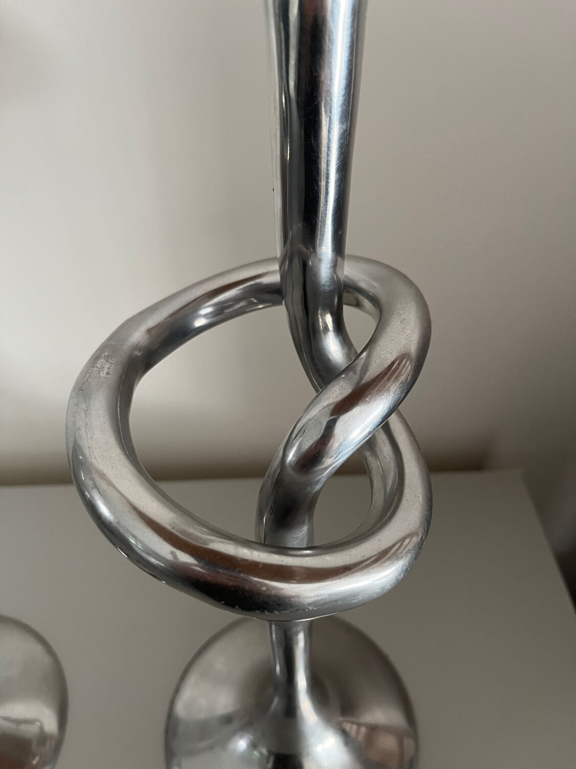 Pair of large kare design cast aluminum candlesticks