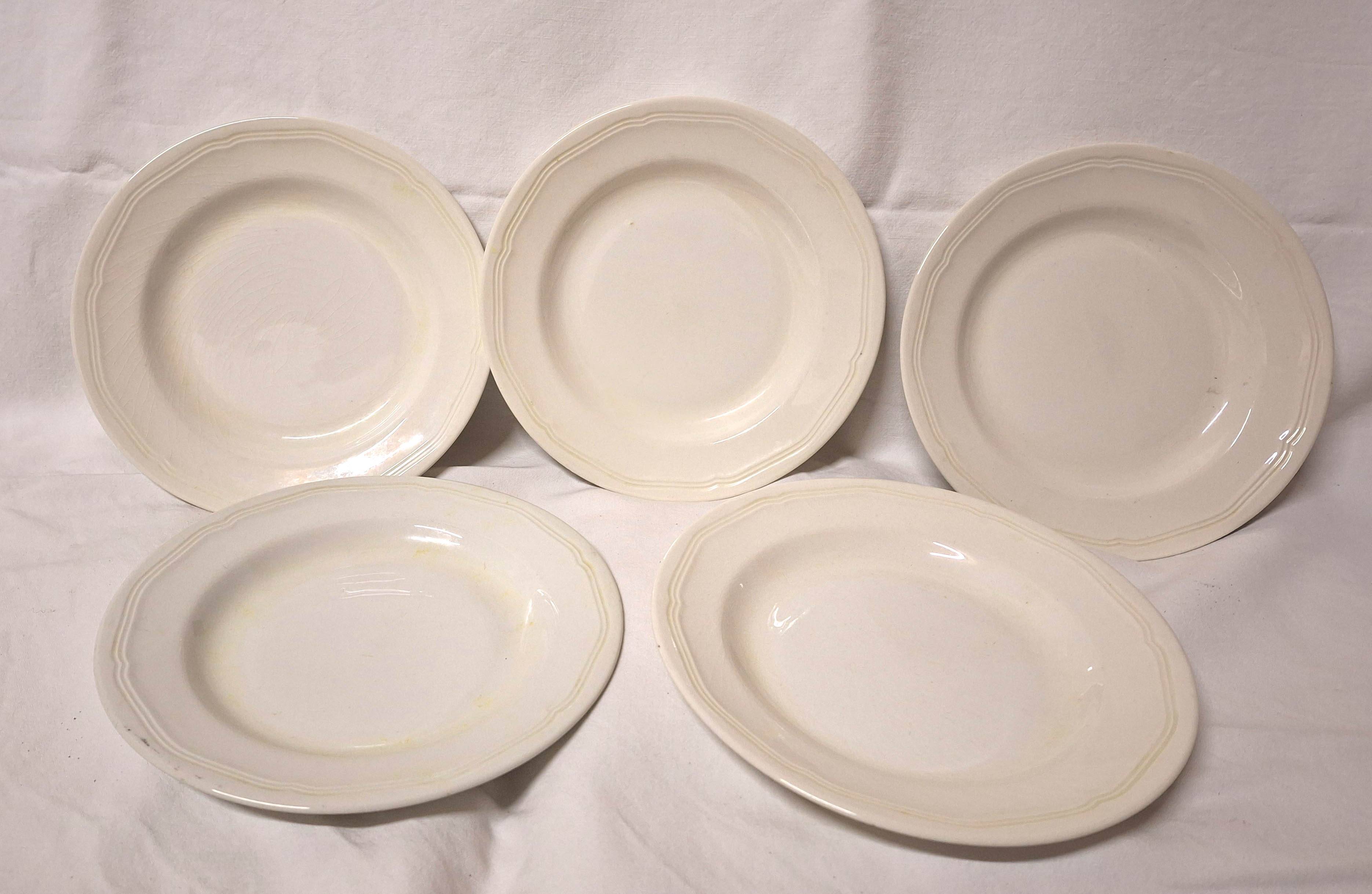 15 white earthenware plates