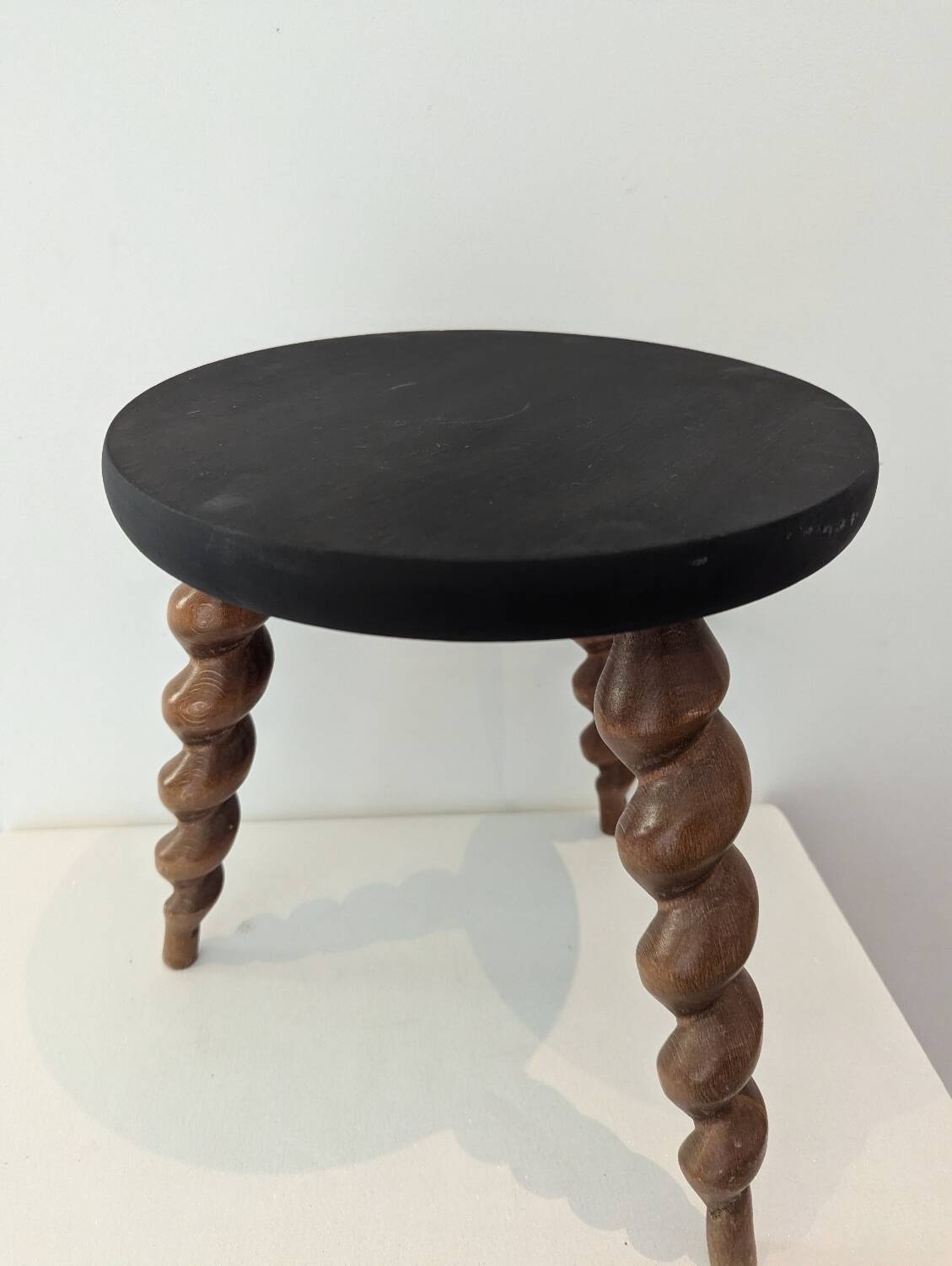 Wooden tripod stool