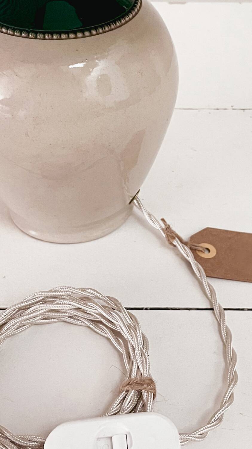 Sandstone lamp and striped lampshade