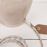 Sandstone lamp and striped lampshade
