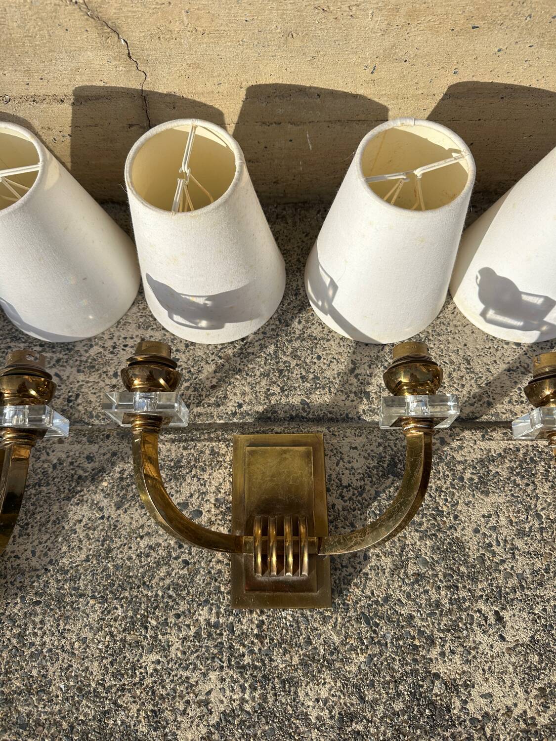 Antique Art Deco wall sconces attributed to Jacques Adnet.