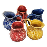 Set of 5 old onnaing barbotine jugs. creamer, sauce boat