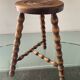 Vintage wooden tripod stool