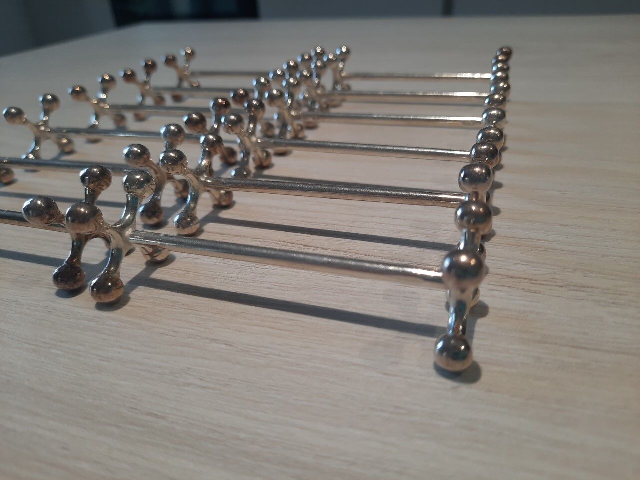 Set of 12 silver metal knife holders