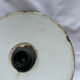 Old green and white enamelled sheet metal suspension