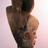 Punu mask on a base