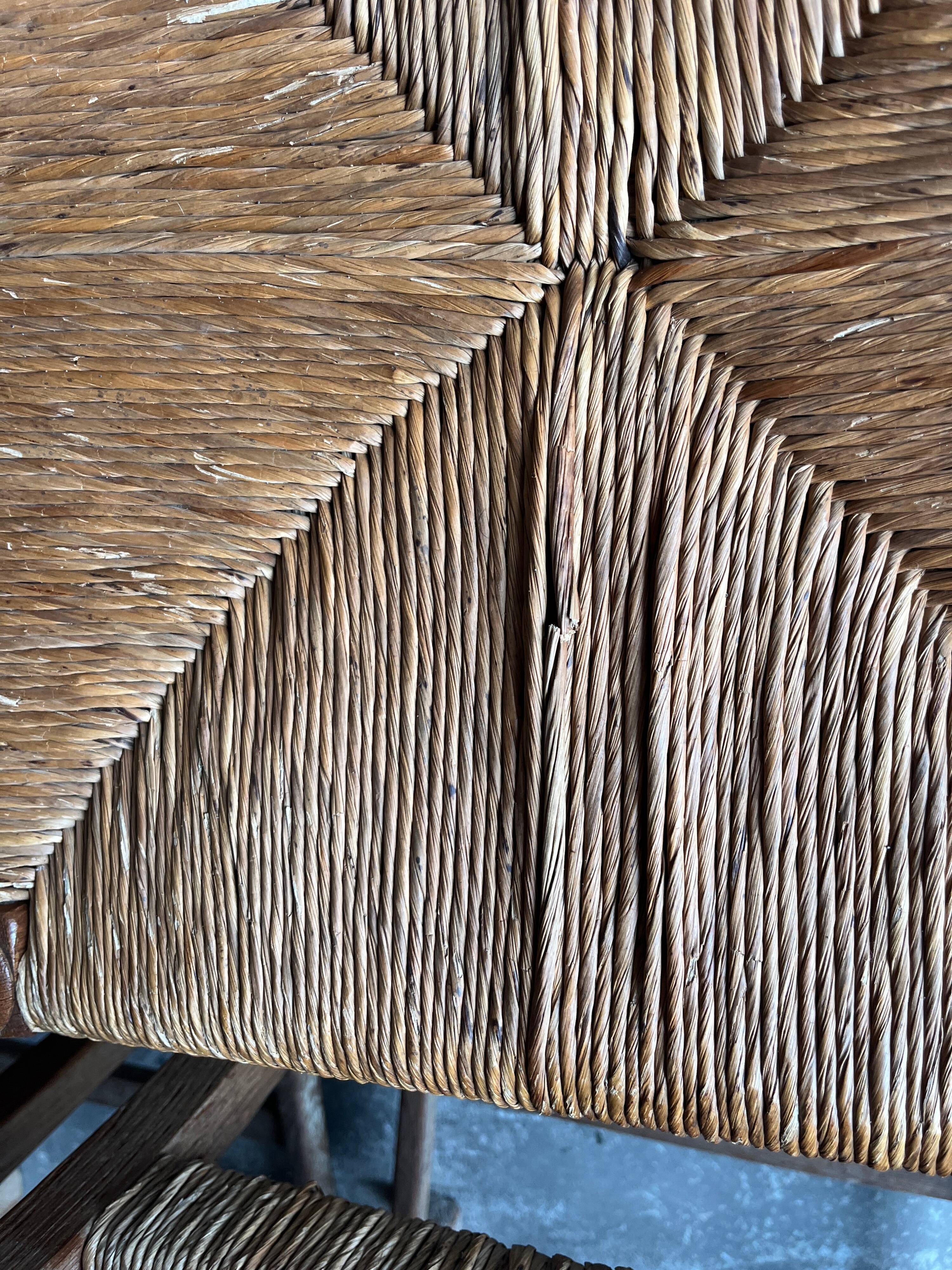 Set of 6 sculpted oak chairs with straw seats – 1950s