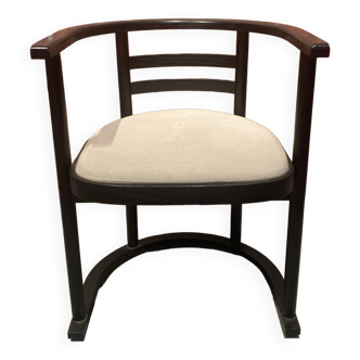 Blackened wooden armchair