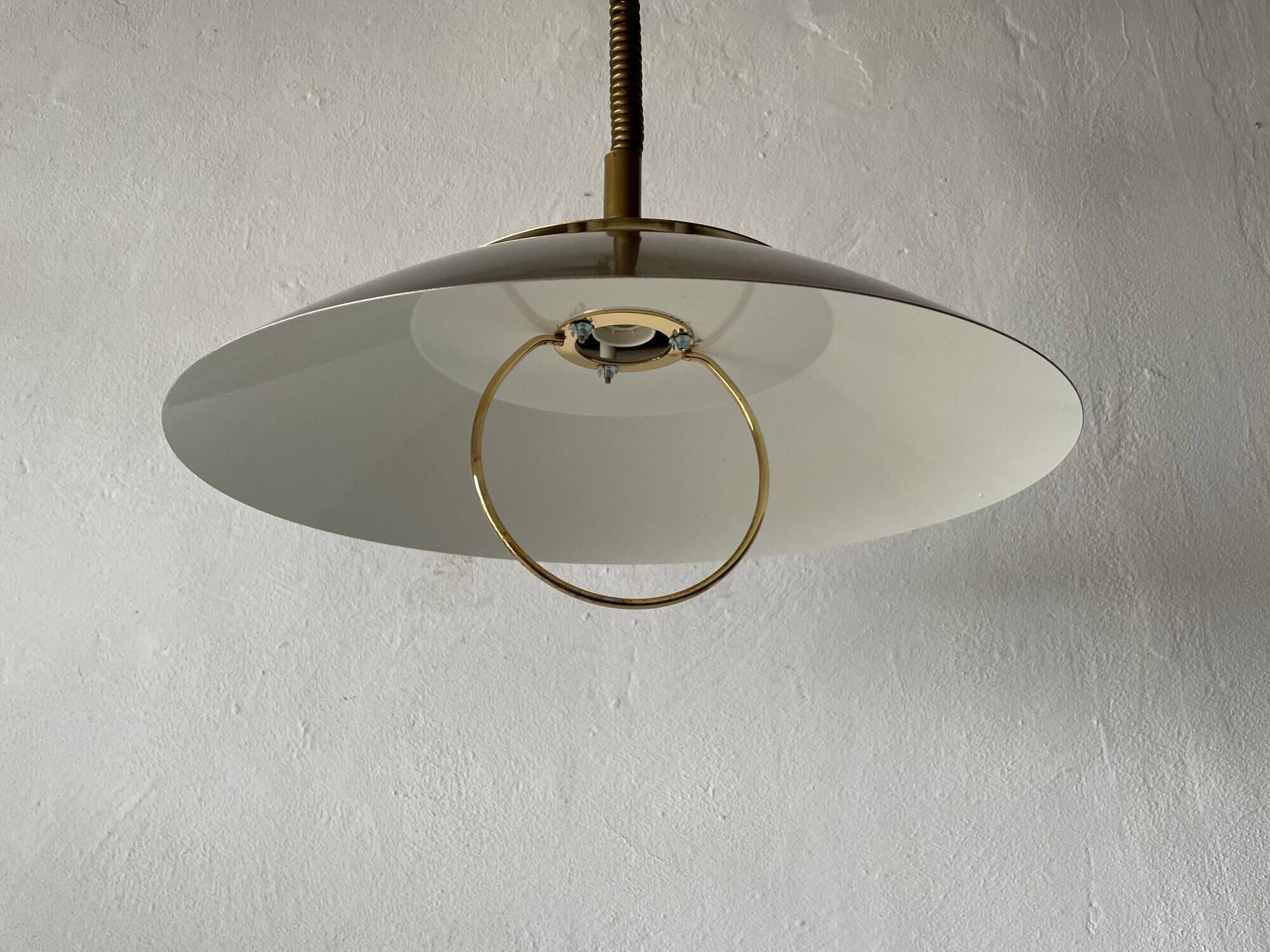 Suspended lamp in chrome and gold metal by TZ, 1970s, Germany.