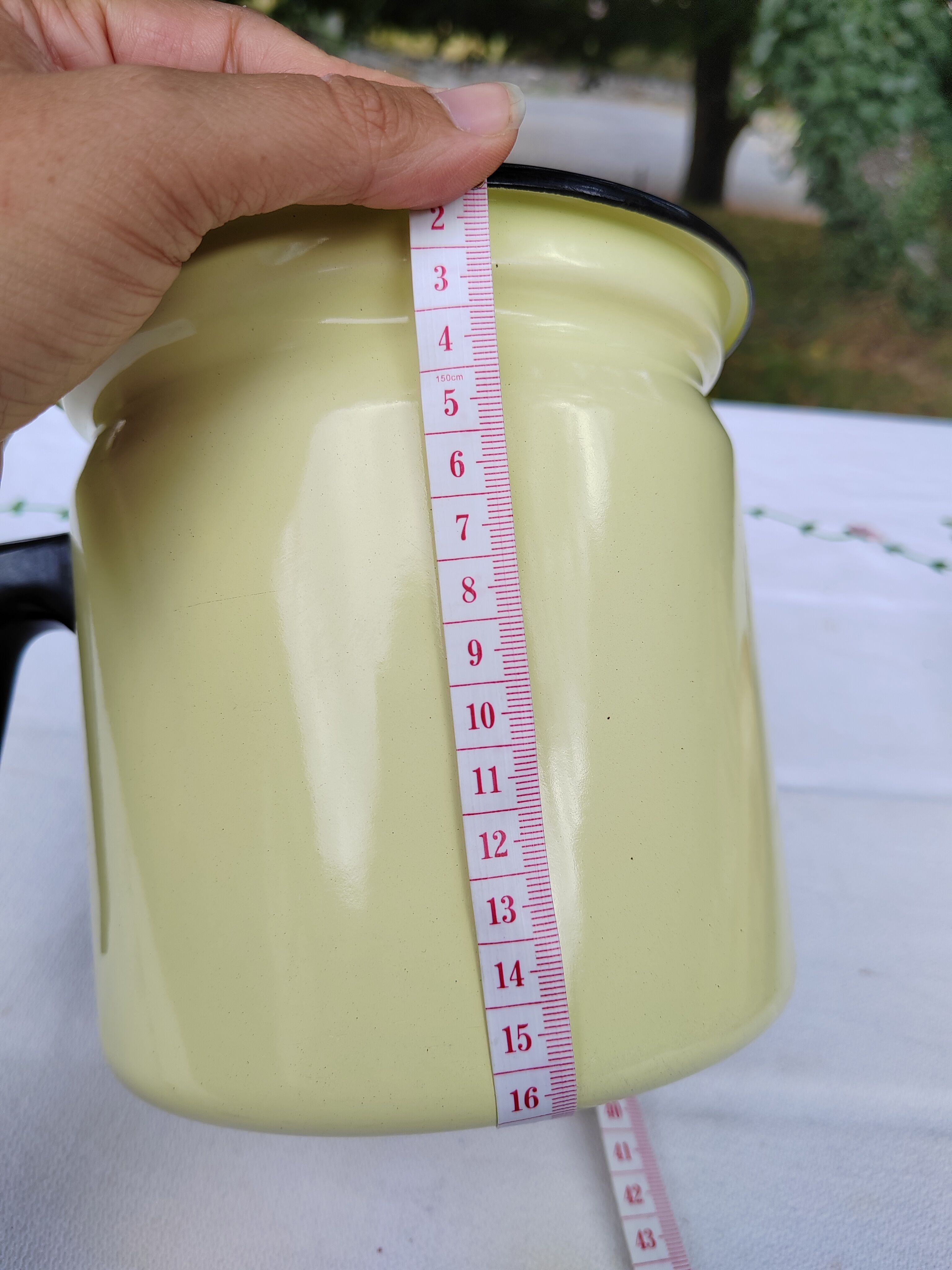 Yellow enamelled milk kettle