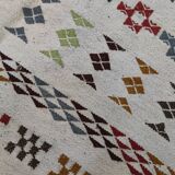 Handmade rugs in natural wool with traditional patterns