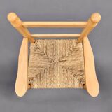 Old wooden and straw high chair for children