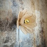 Flower wall light made of rattan petals and nude embroidery