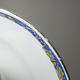 Old Lunéville sauce boat, opaque porcelain with polychrome decoration.