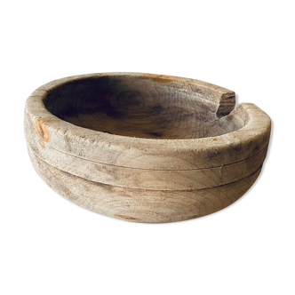 Large old bowl in raw wood