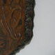 Antique bevelled artisanal mirror in repoussé copper - 54x45cm