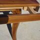 Antique solid walnut table with marquetry and extensions.