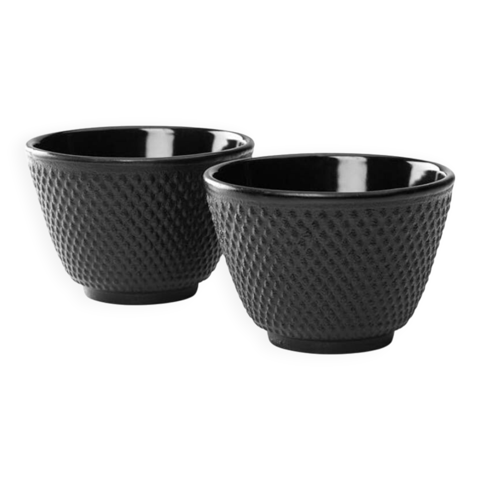 2 cast iron tea cups