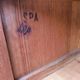 Vintage 1940s secretary desk with wooden curtains, storage, and shutters.