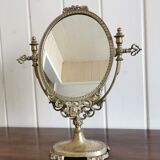 Oval mirror on psyche stand