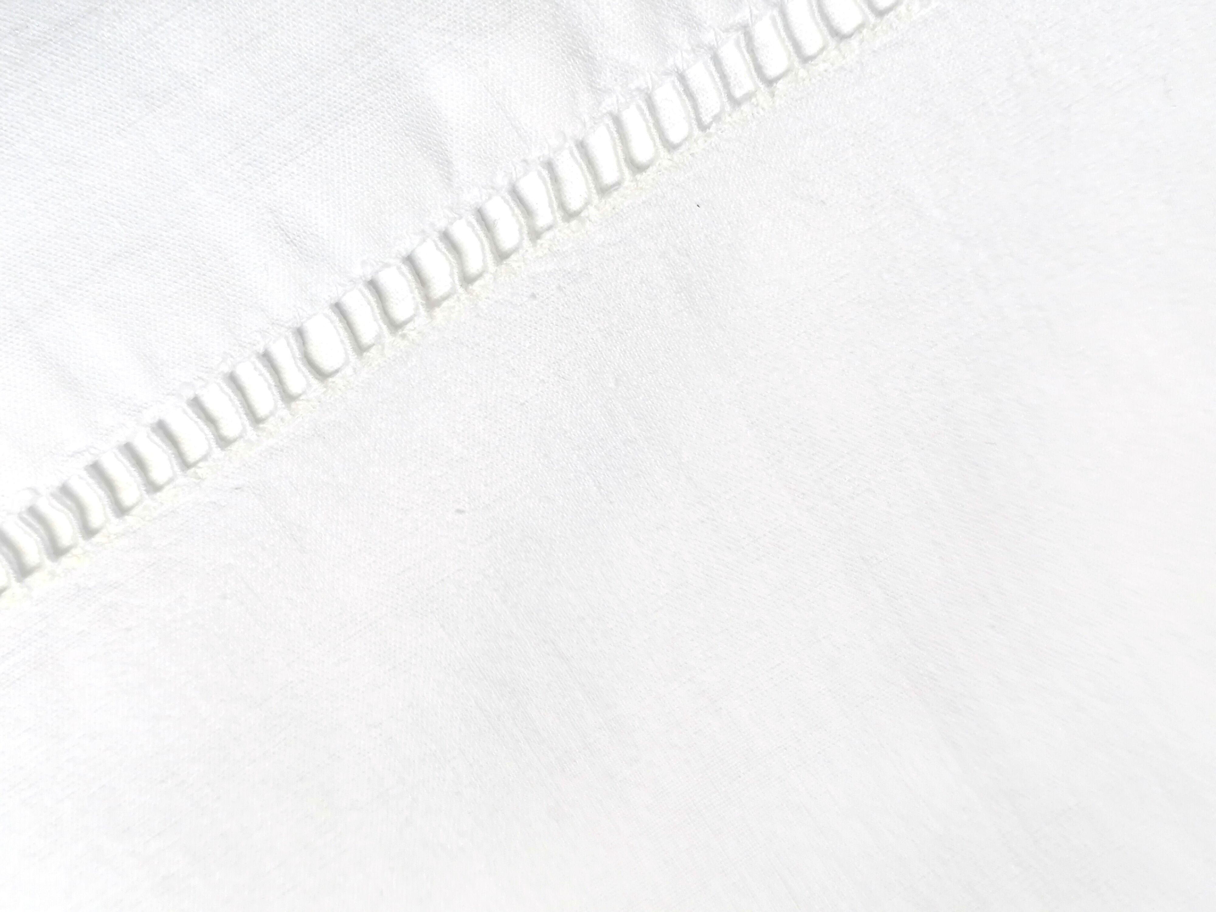 M and D monogram embroidered sheet