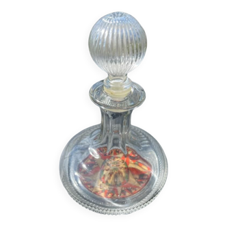 Empty Avon perfume bottle