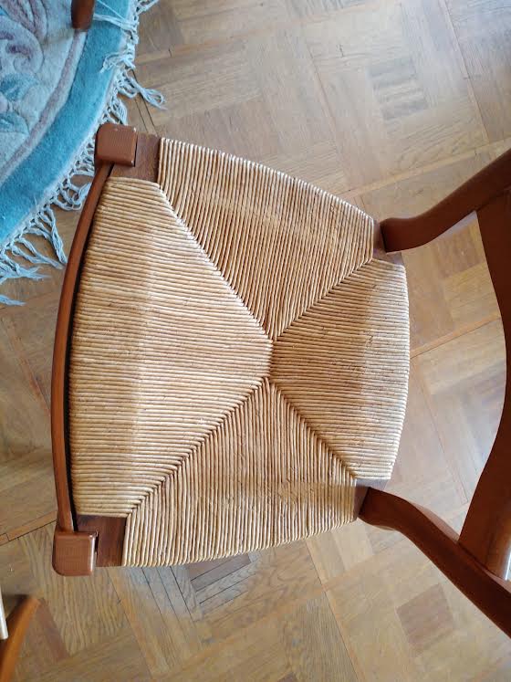 6 mulched solid wood chairs and 2 canework chairs