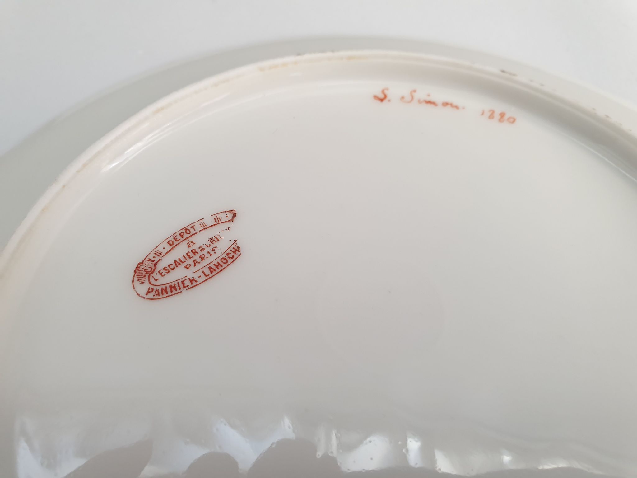 Two antique porcelain plates from Paris The crystal staircase