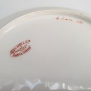 Two antique porcelain plates from Paris The crystal staircase
