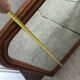 Beveled mirror in solid wood